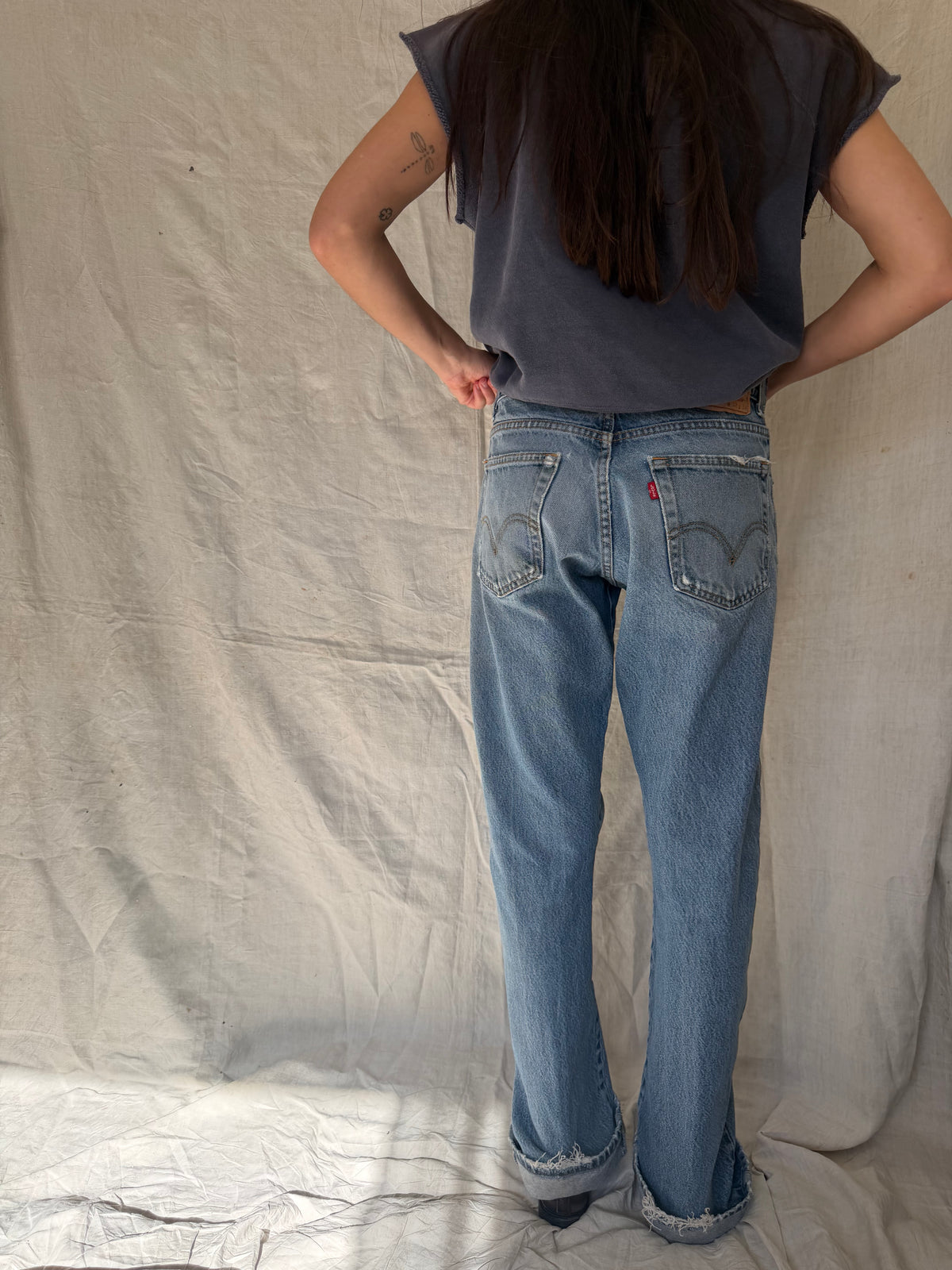 Medium/Light Wash Distressed Levi’s 517 05