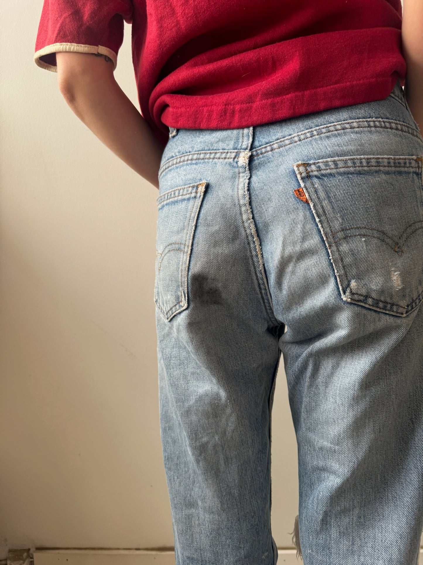 Distressed and Worn Orange Tab Levi’s