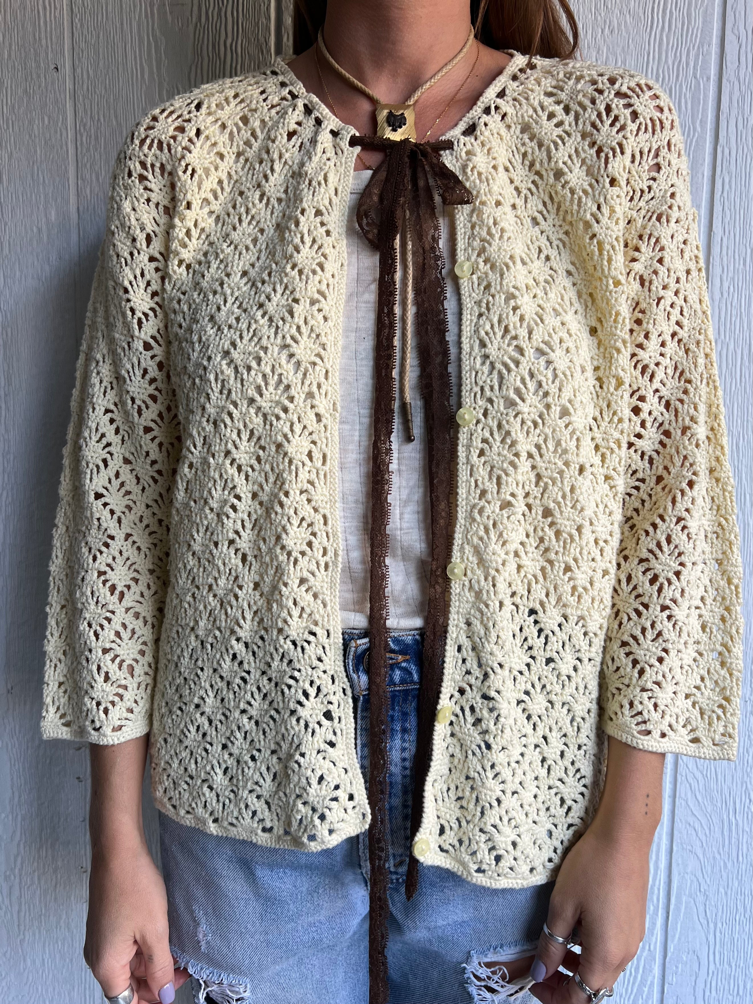 Cream Crochet Cardigan with a Brown Lace Bow