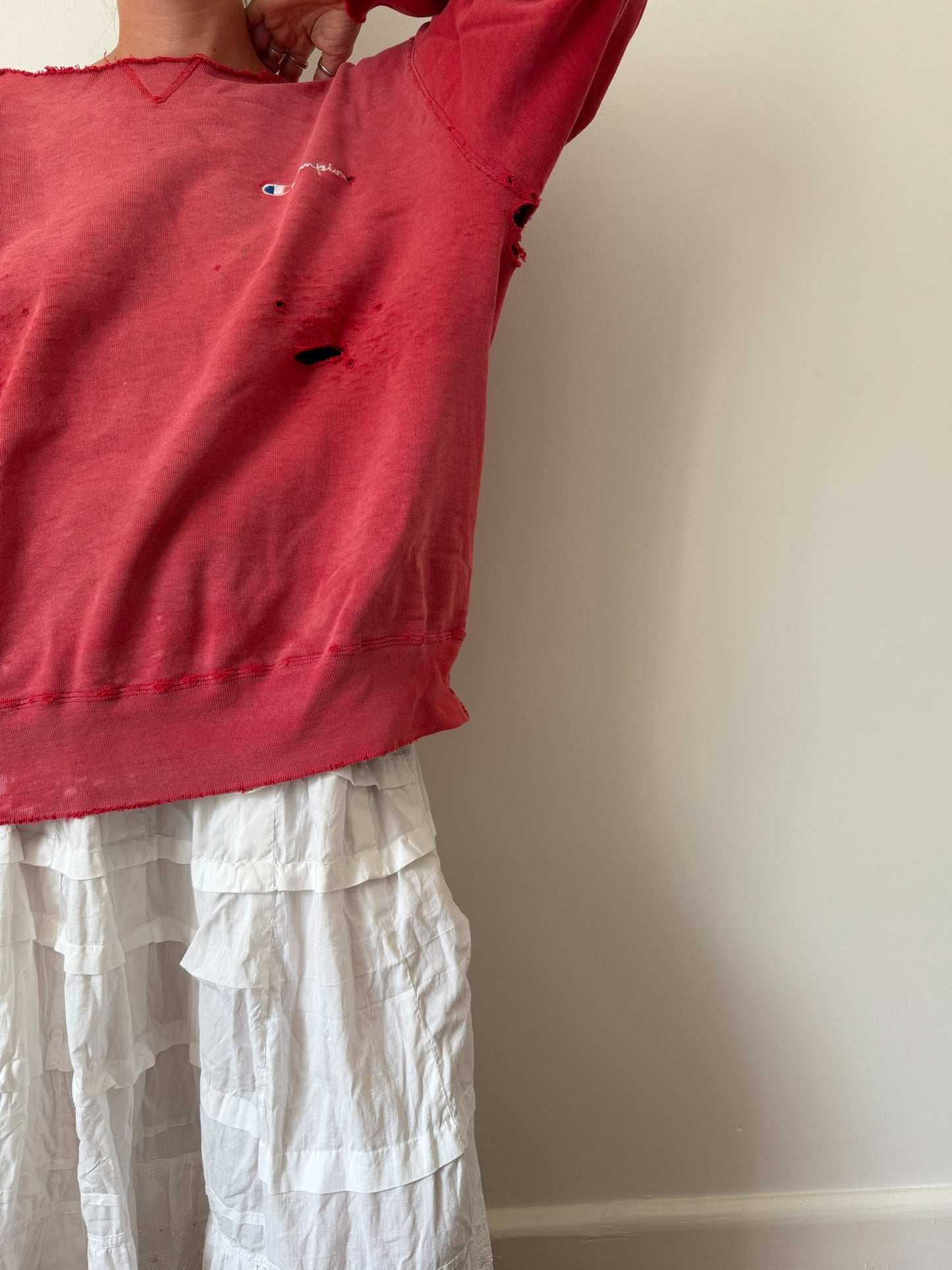 Faded and Distressed Red Champion Crewneck