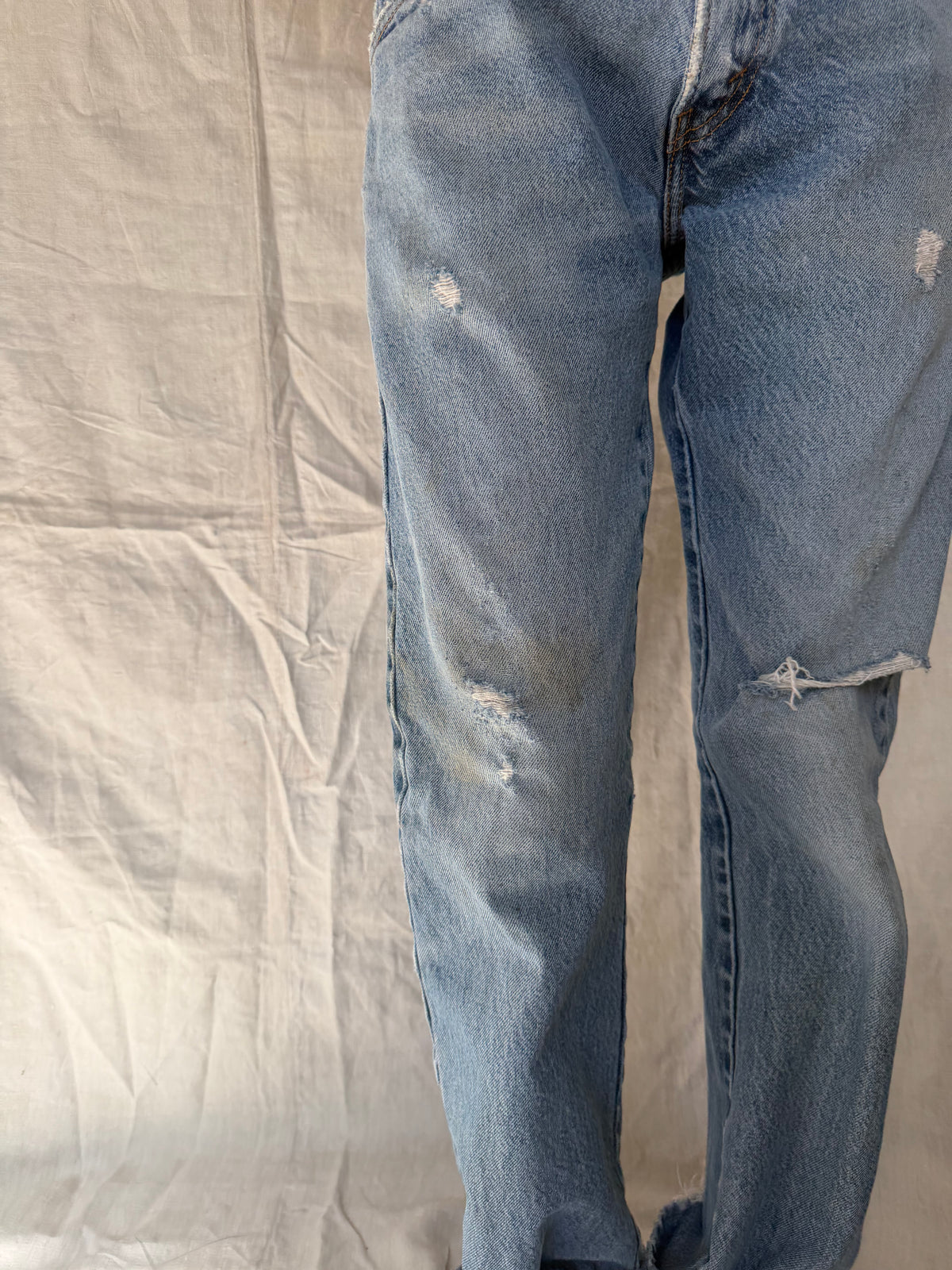 Medium/Light Wash Distressed Levi’s 517 05