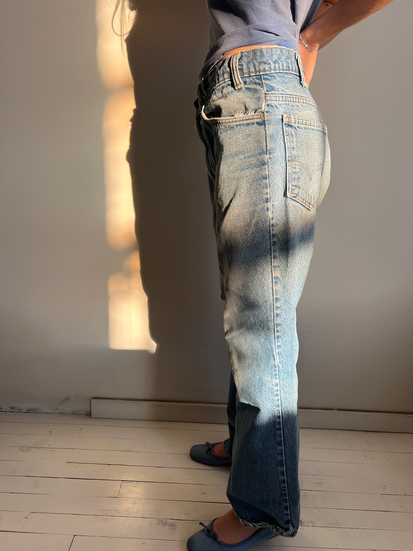 Faded and Distressed Orange Tab Levi’s