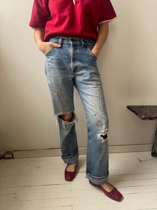 Distressed and Worn Orange Tab Levi’s