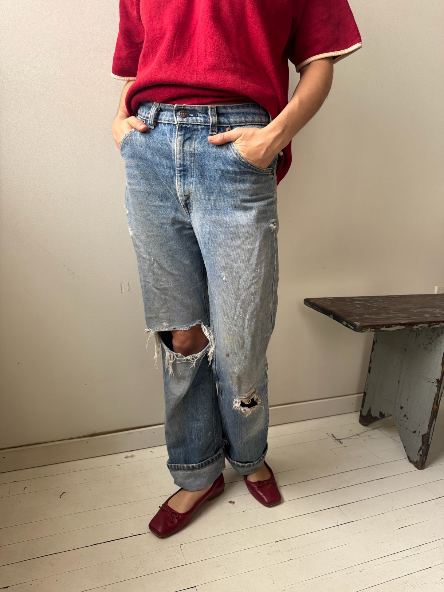 Distressed and Worn Orange Tab Levi’s